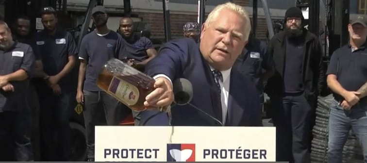 Doug Ford pours out Crown Royal whiskey