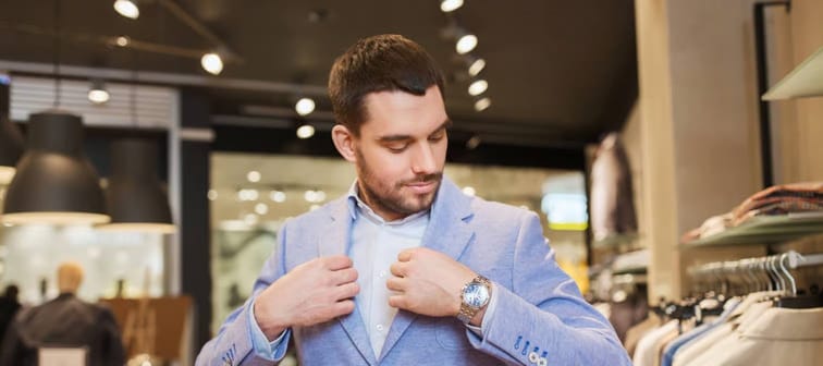 Man trying on a sport jacket