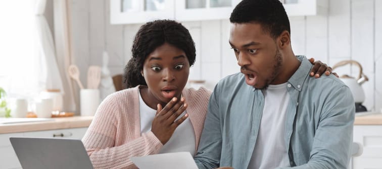Couple looking shocked