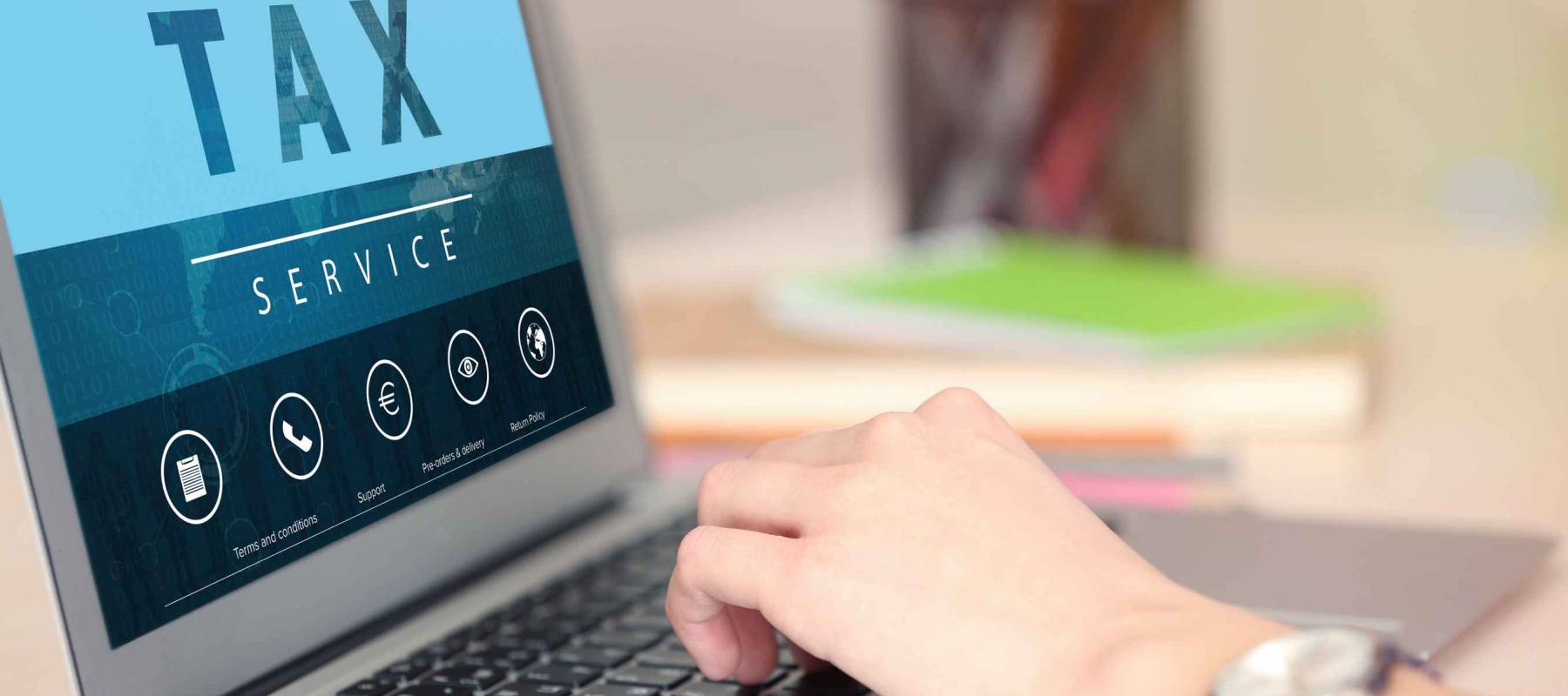 Online Tax payment concept. Woman typing on laptop, closeup