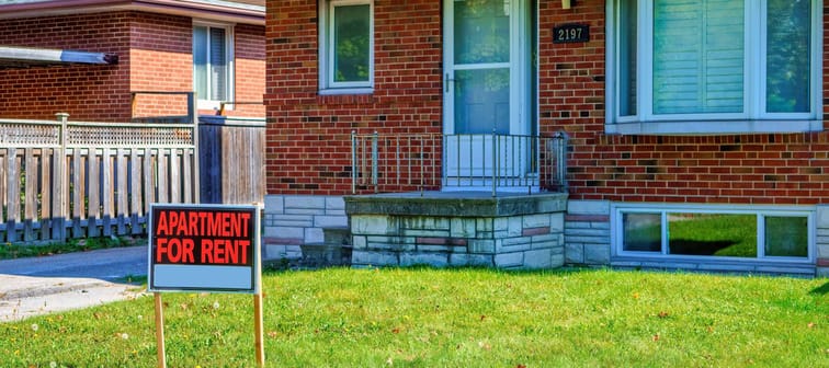 For rent sign in front of house